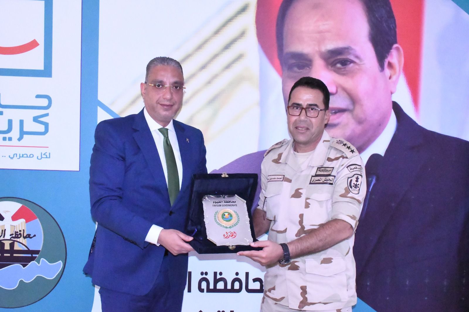 الدكتور أحمد الأنصاري محافظ الفيوم والعميد أحمد حسين بدوي